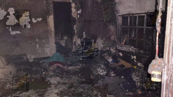 Policías municipales rescatan a familia del incendio de su casa