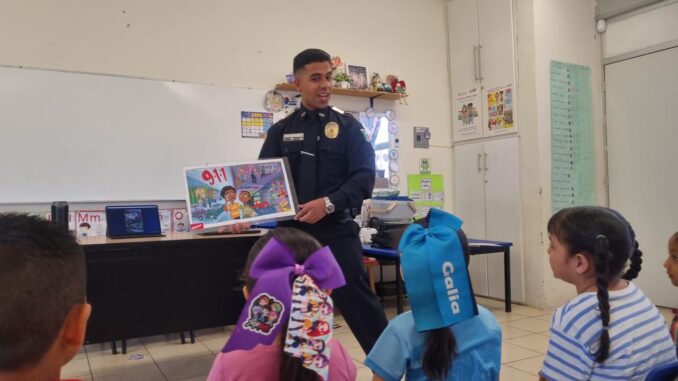 Agente DARE crea herramienta didáctica para niños en el uso correcto del 911